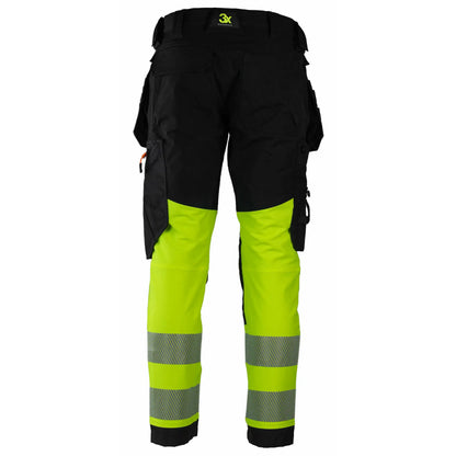 Tor Bukse - Kort benlengde 3X, funksjonell arbeidsbukse med kort benlengde, knelommer for knebeskyttere, avtagbare hengelommer, laget av 90 % resirkulert nylon og 10 % spandex, oppfyller EN 20471 klasse 1 for synlighet, tilgjengelig i sort med fluoriserende gule detaljer.