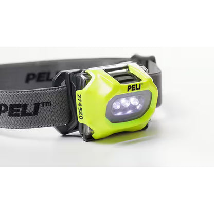 Peli 2745Z0 LED hodelykt med sikkerhetsgodkjenning for farlige miljøer, ultrakompakt design, opptil 33 lumen lysstyrke og 40 timers driftstid, ideell for profesjonell og fritidsbruk.